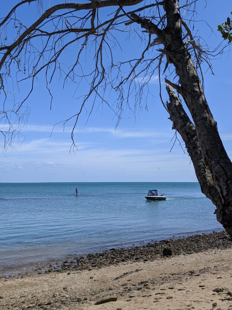 Motorboat Parked on Sandy Beach — Secondhand Boat Motors in Hervey Bay