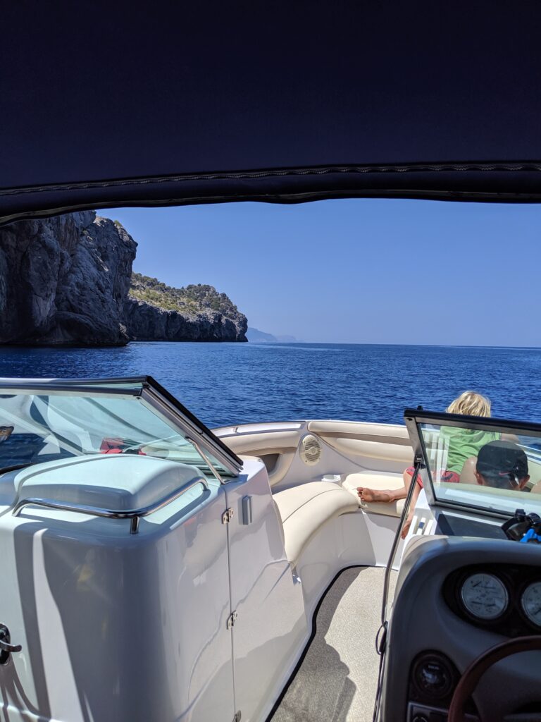 Motorboat Sailing on The Ocean, View from The Back — Secondhand Boat Motors in Hervey Bay